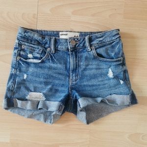 Distressed denim shorts